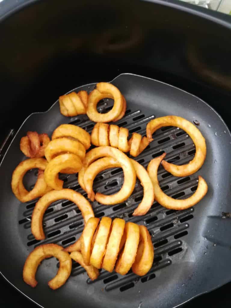 our first result from cooking frozen curly fries in our air fryer!