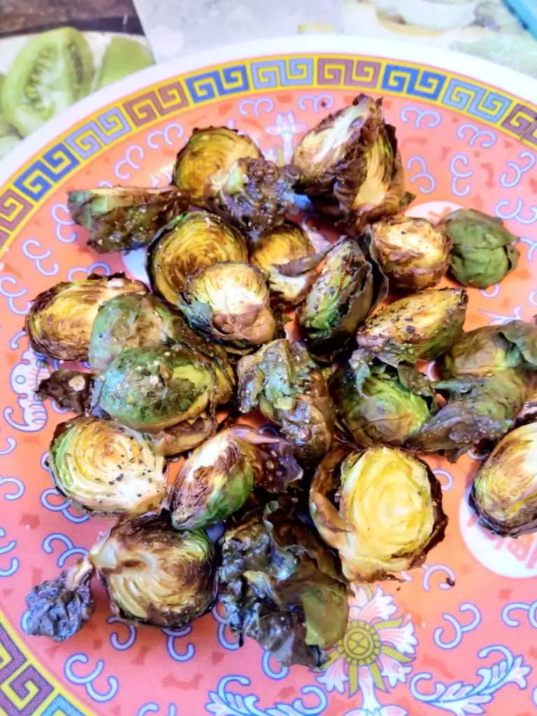 roasted Brussels sprouts with oil, pepper and salt. Crispy and pretty yummy!!