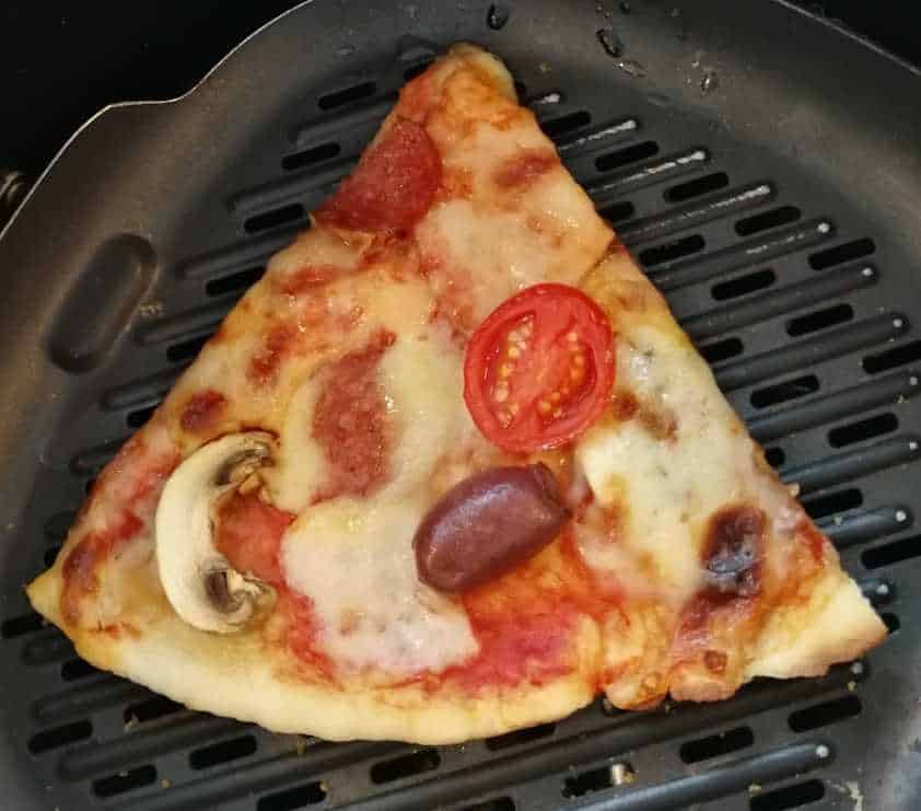How do you reheat frozen pizza in an air fryer?