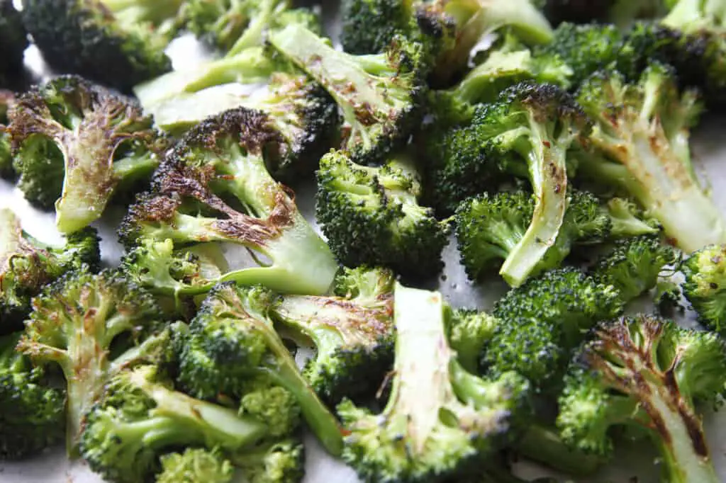 Close-up of frozen broccoli that was roasted in an air fryer.